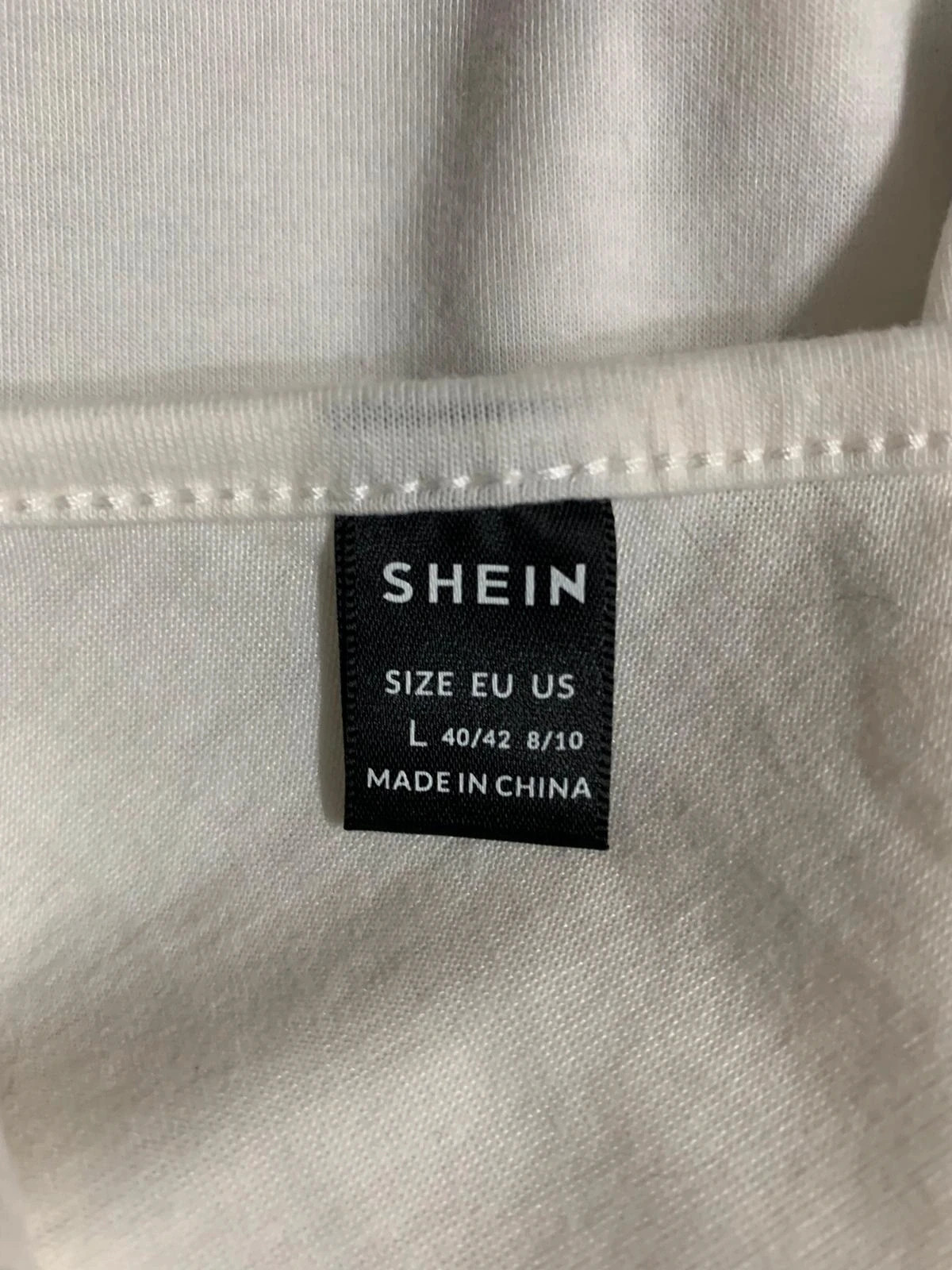 Blusa asimétrica blanca con volante en el hombro | White one-shoulder ruffle blouse | Shein – Shein – taille L / 40 / 12 4