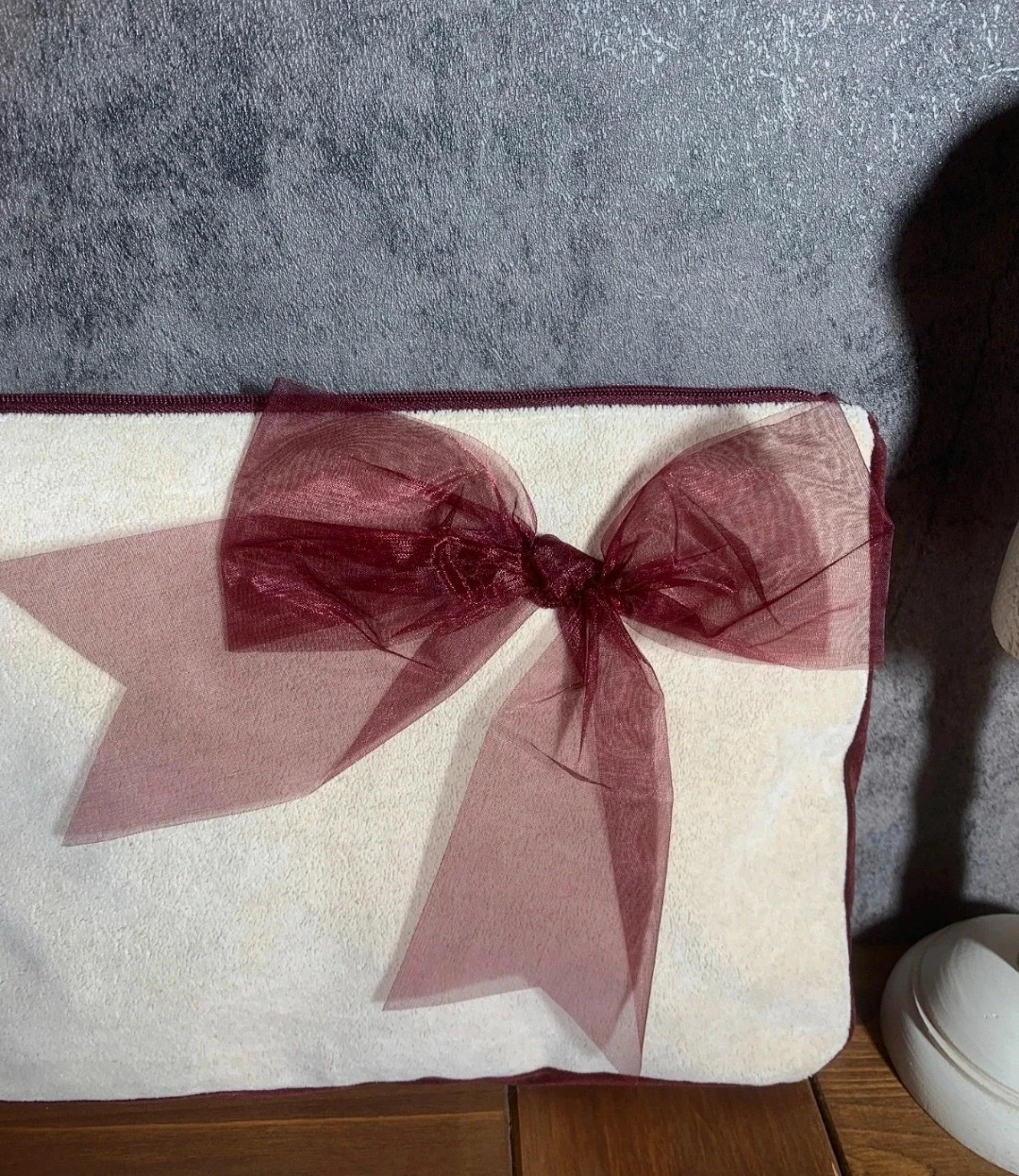Beige Fabric Toiletry Bag with Zipper Closure and Decorative Maroon Bow 4
