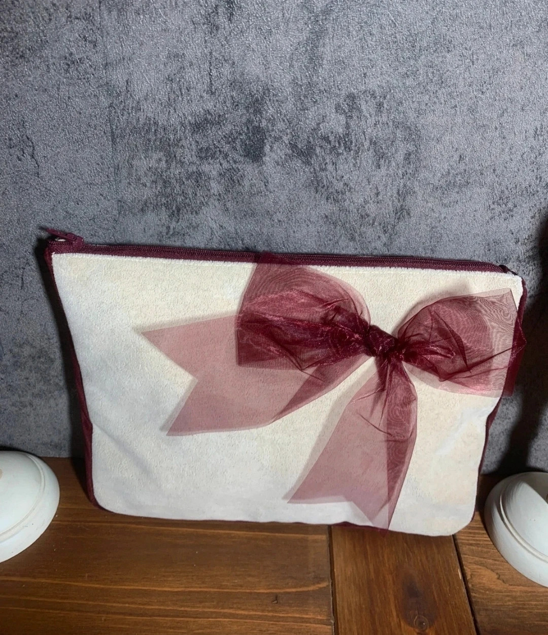 Beige Fabric Toiletry Bag with Zipper Closure and Decorative Maroon Bow 5