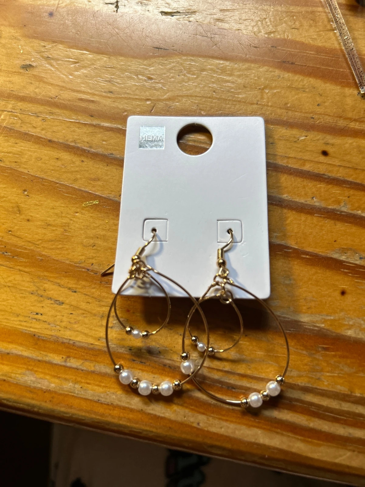 Boucle d’oreilles dorée perle blanche neufavecetiquette – Hema 4