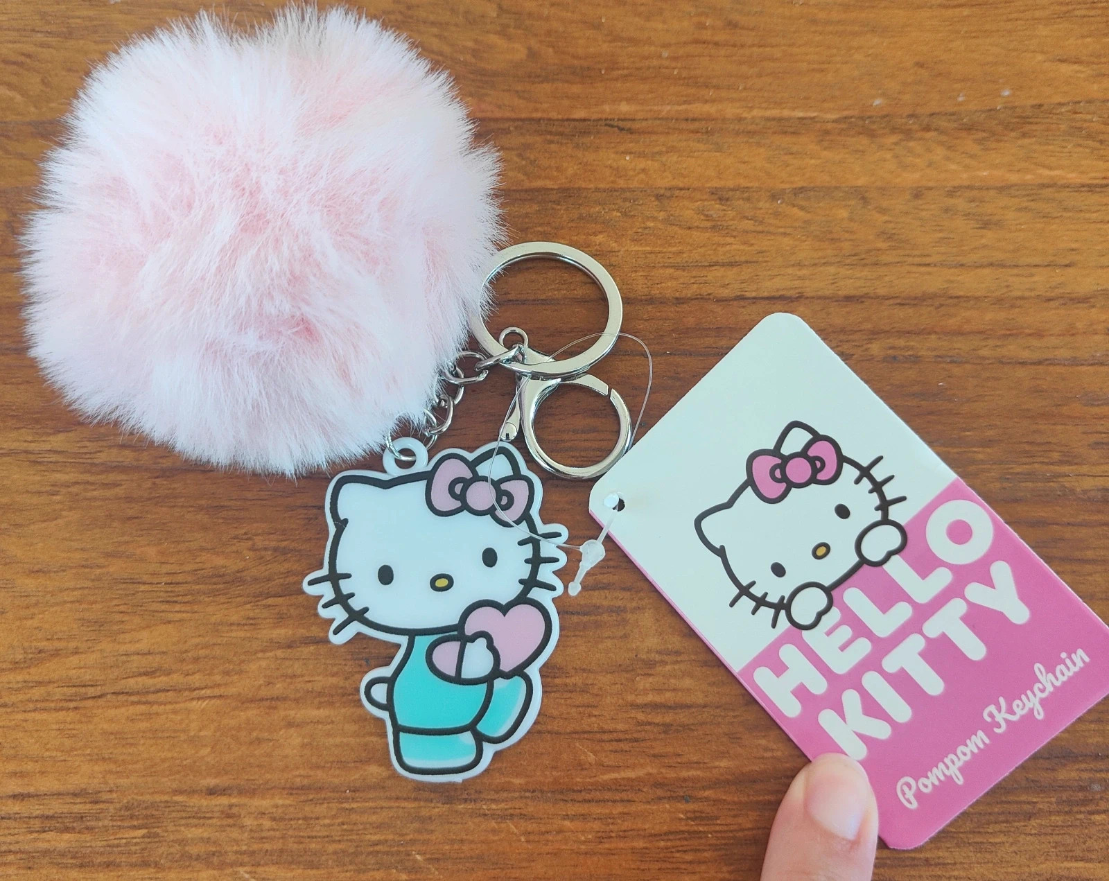 Porte-clés Hello Kitty Sanrio avec étiquette / Pompon rose