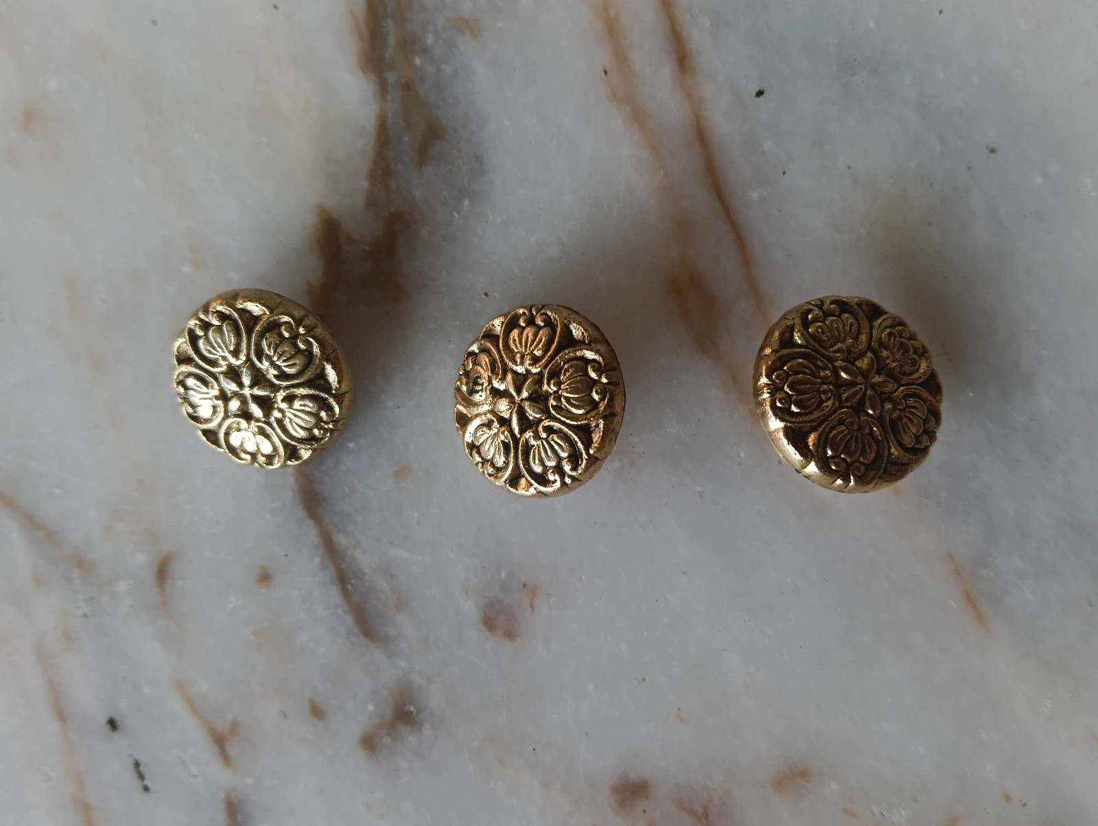 Three vintage buttons gold tone