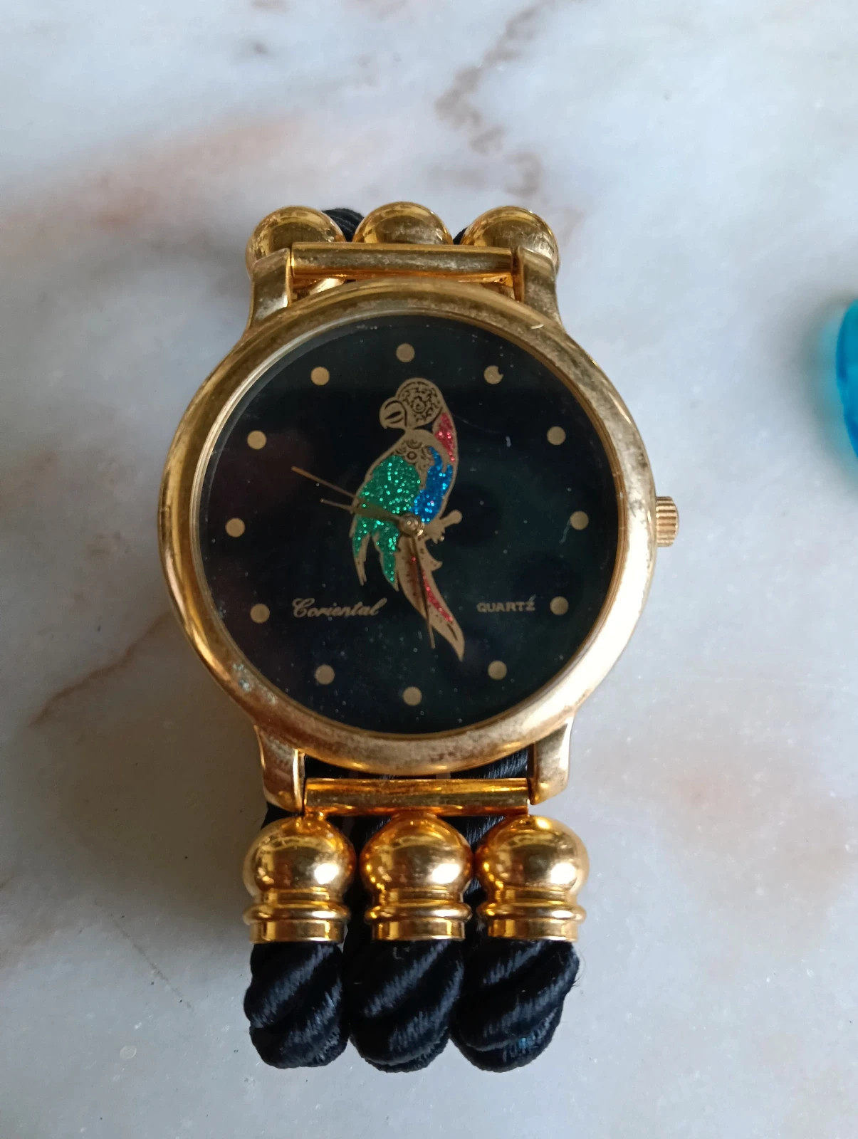 Vintage Coriental quartz with parrot dial triple black rope strap