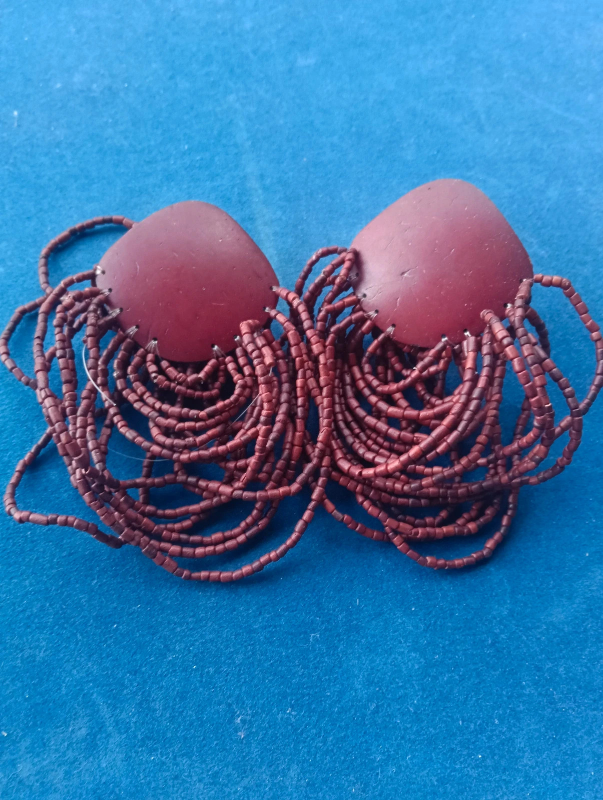 Boho statement clip on earrings with cascading red seed beads – vintage bohemian
