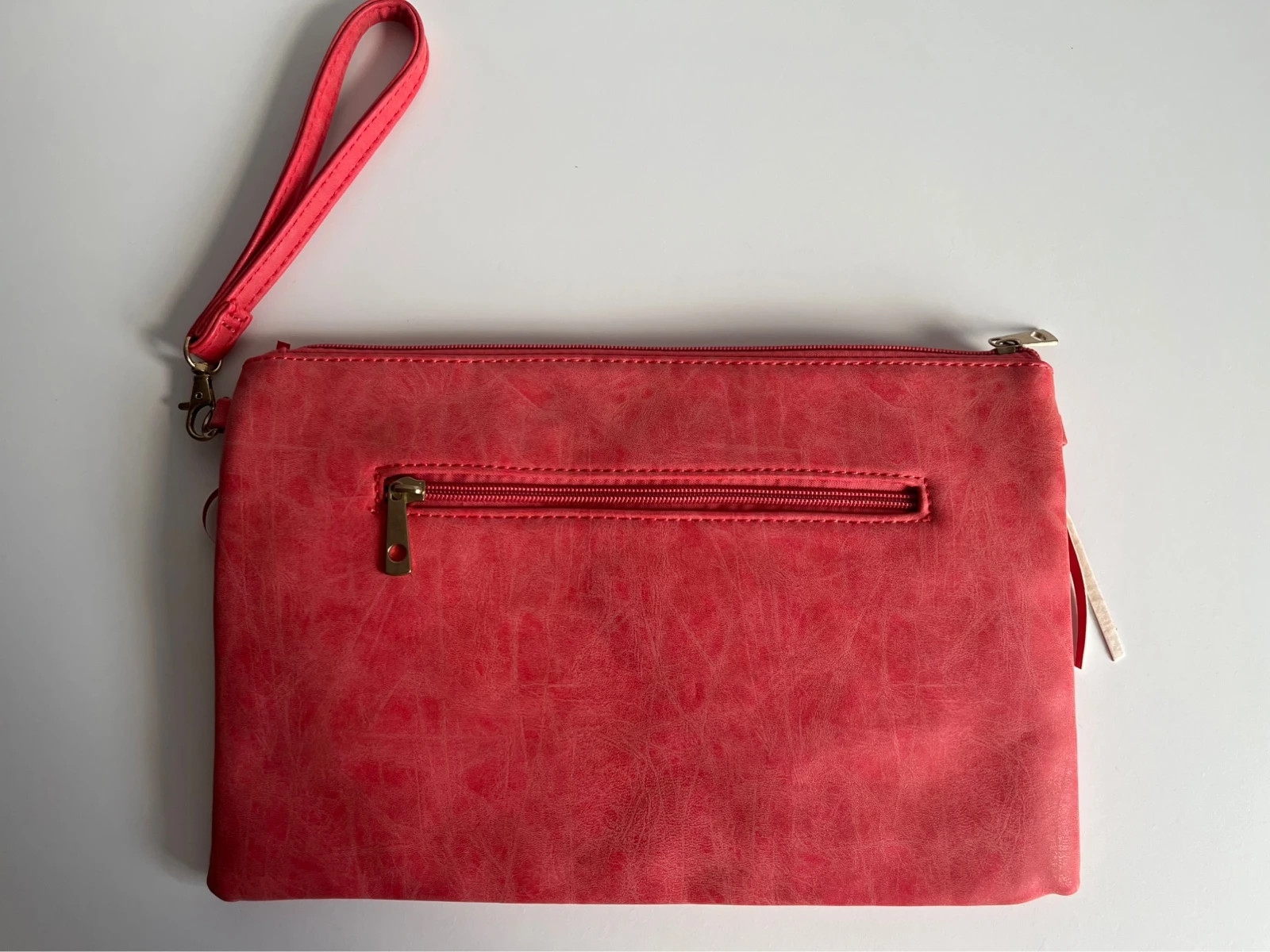 Bolso rosa coral con flecos y tachas 2