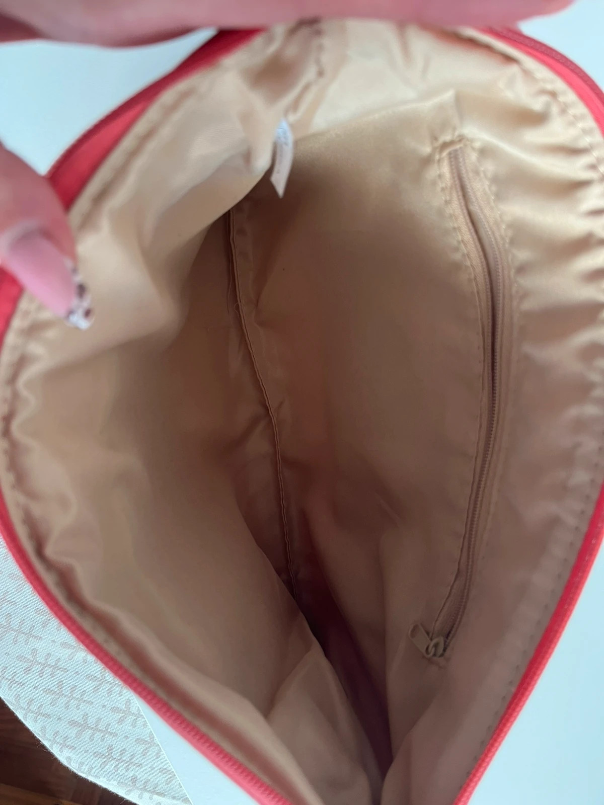 Bolso rosa coral con flecos y tachas 4