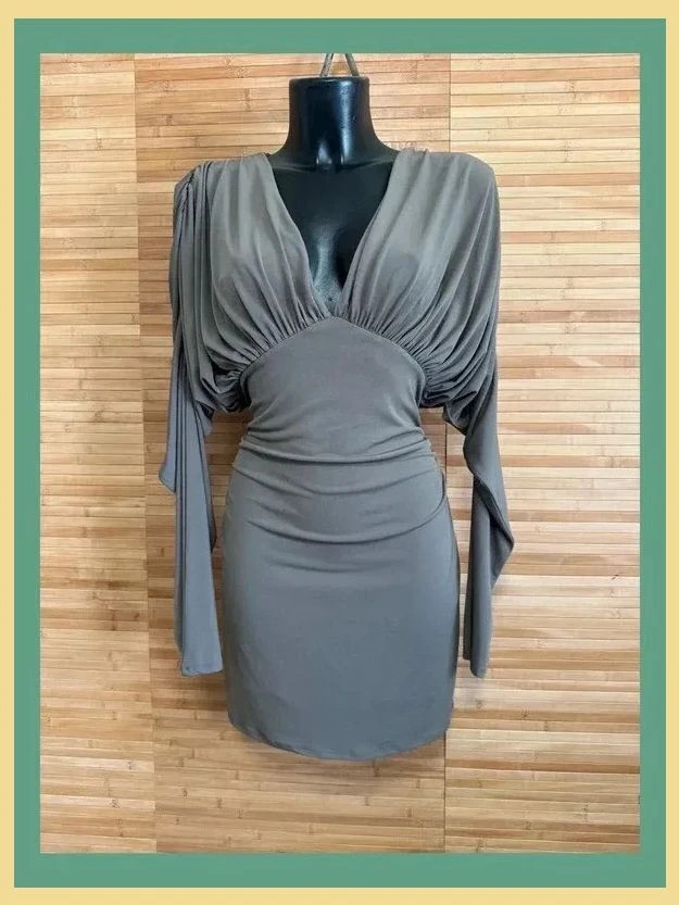 Espectacular vestido drapeado de Zara , elástico, talla L 😍