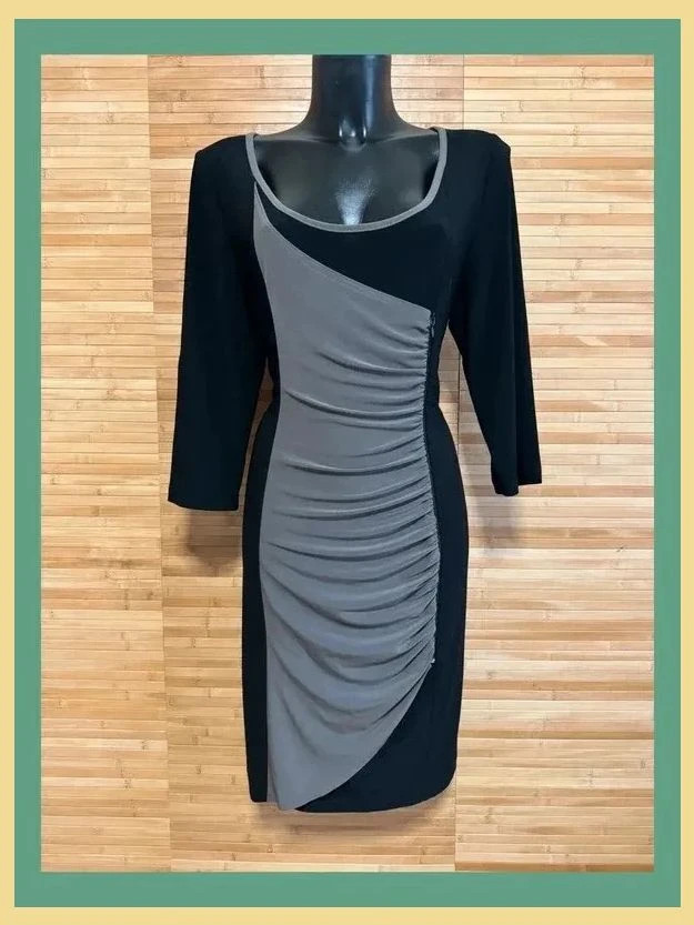 Divino vestido midi de Joseph Ribkoff , talla 48 , elástico 😍