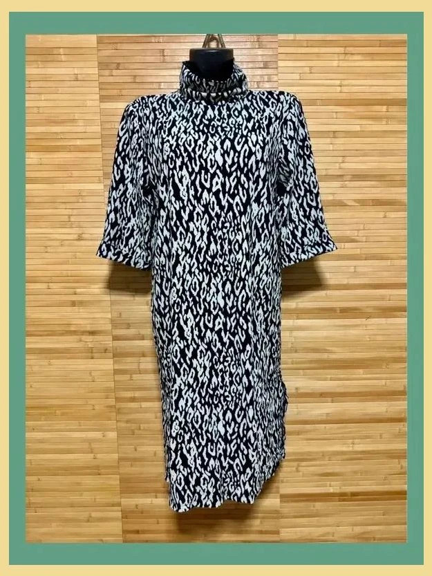 Divino vestido estampado animal print de marca Penn&Ink , talla 40 , elástico 😍