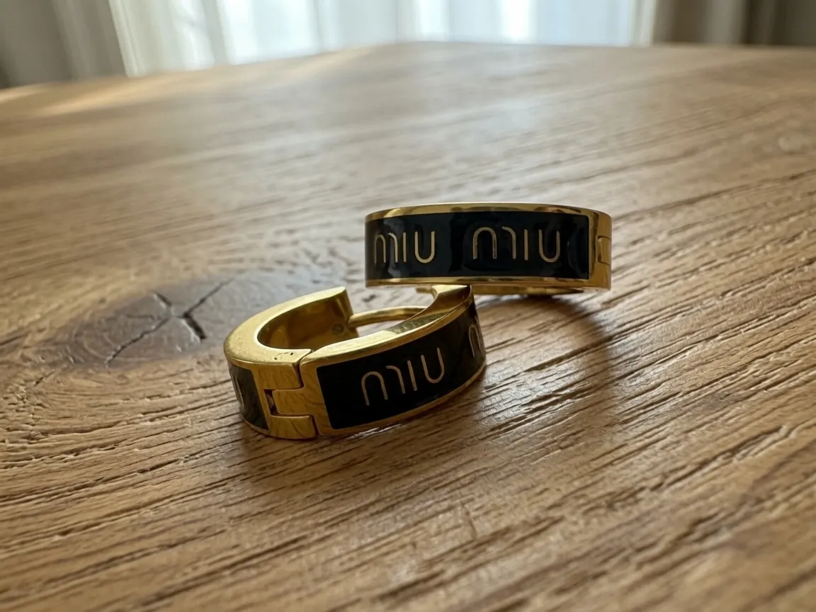 Créoles Miu Miu dorées 2