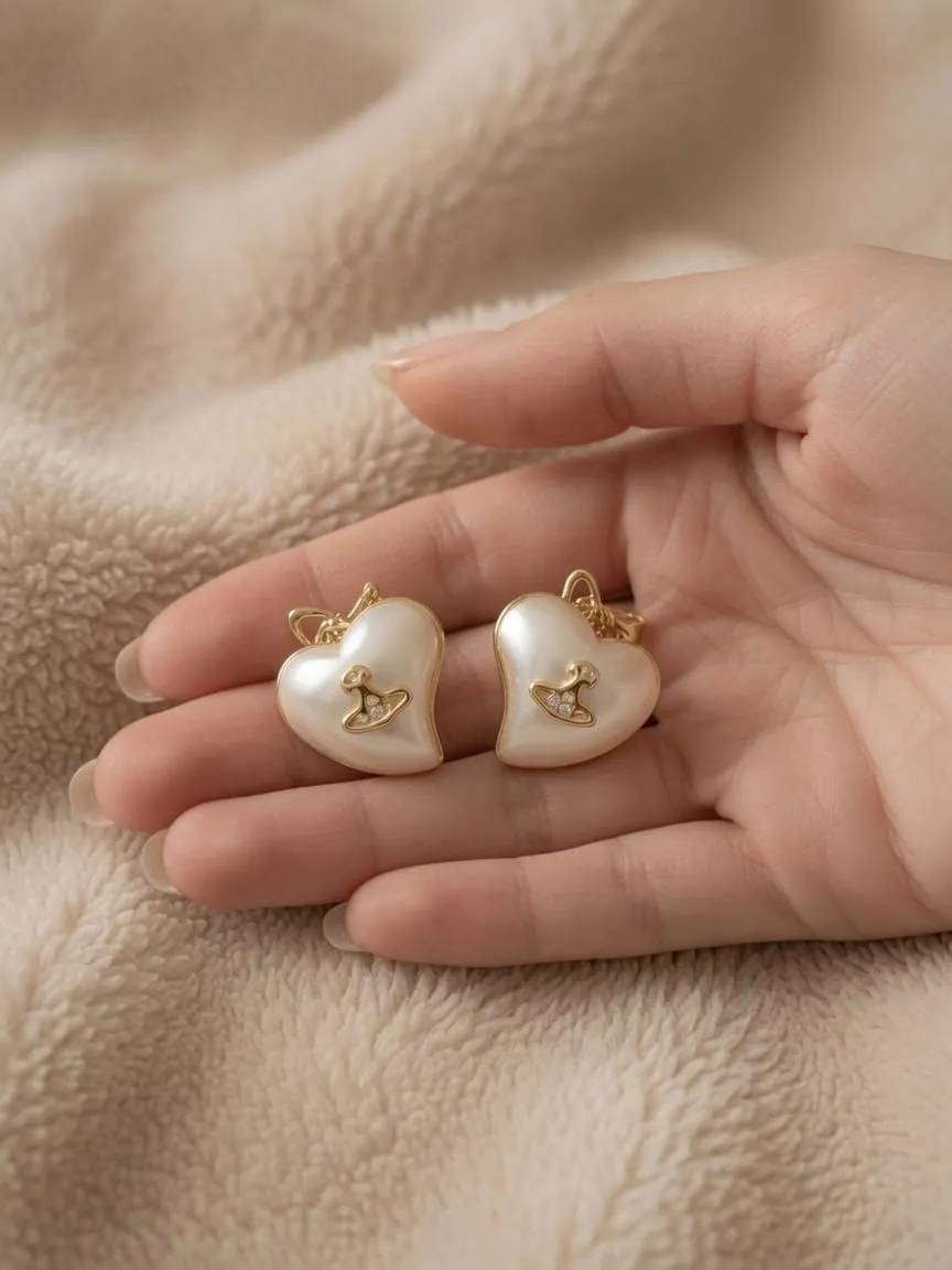 Boucles d'oreilles cœur et perle dorées Vivienne Westwood 2
