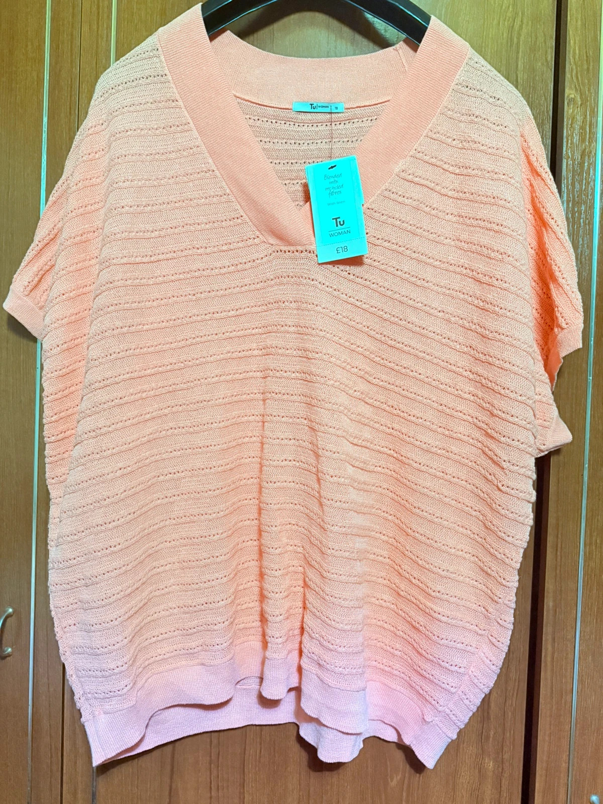 Jersey calado de verano color coral