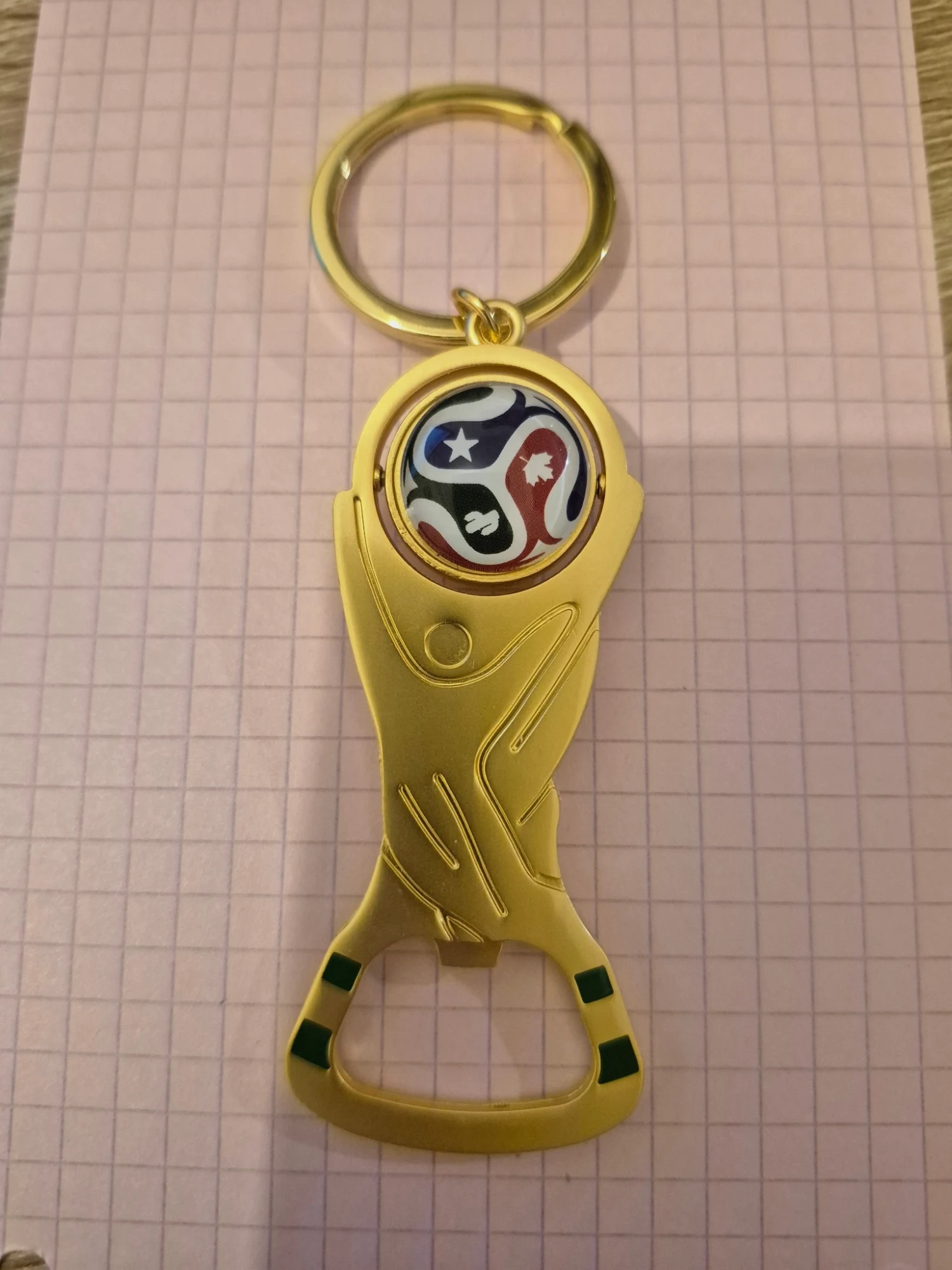 Décapulseur porte cle foot rotatif