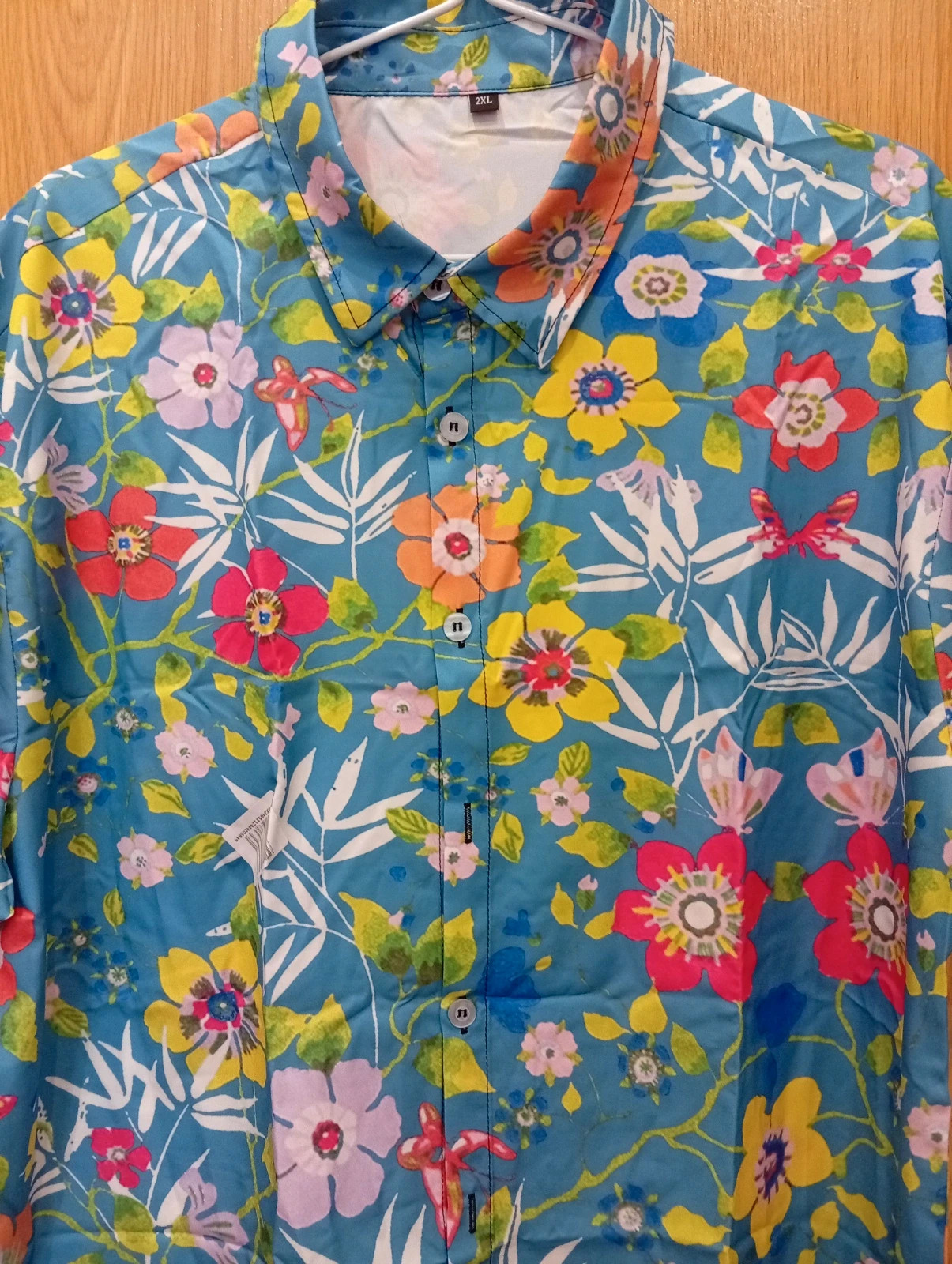 Bright and stylish blue shirt with a colorful floral print. Size L. – taille L 3