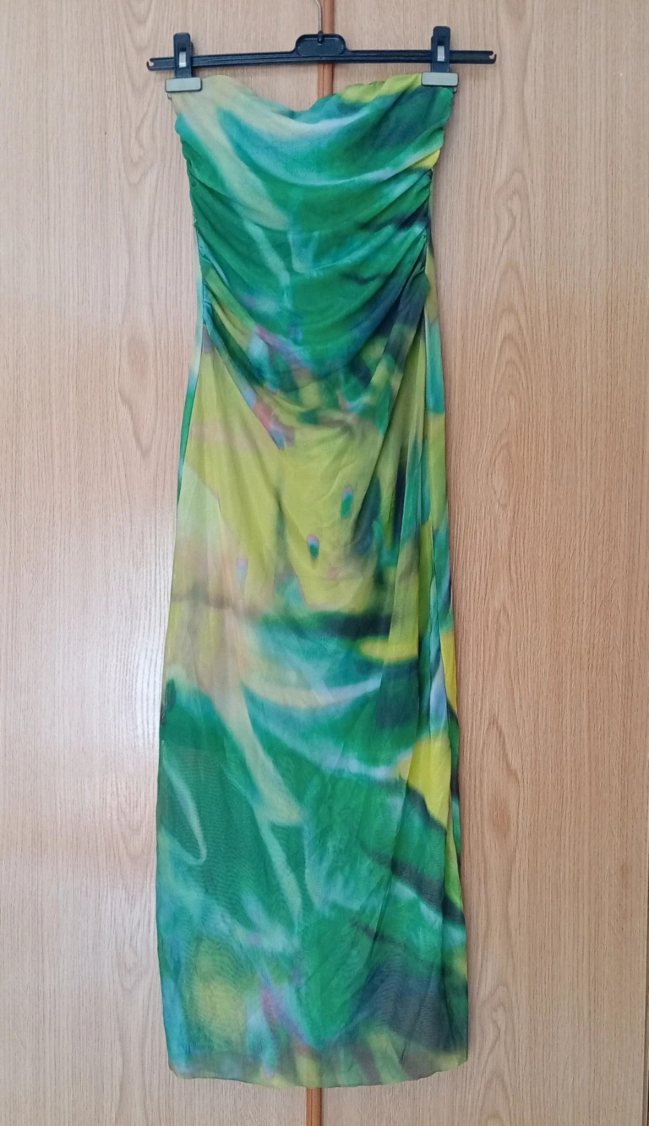 Strapless Green Maxi Dress with a ruched top and beautiful green print.