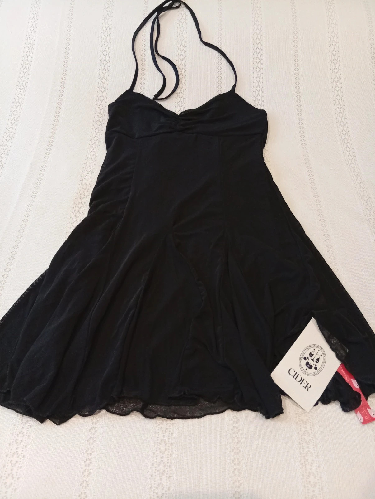 Elegant black dress size XS Halter neckline with a flowy and flattering fit