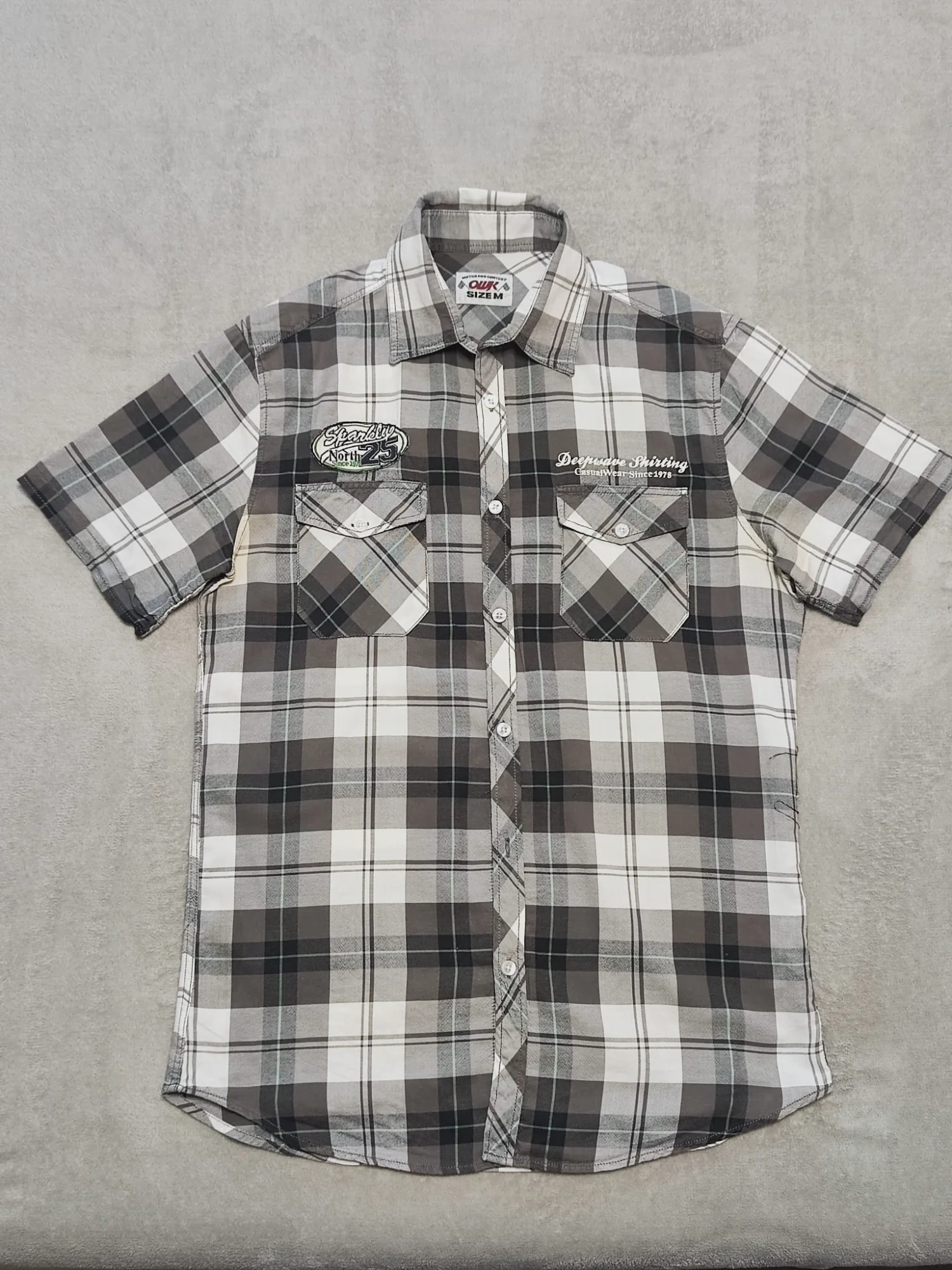 Chemise à carreaux manches courtes noire et grise