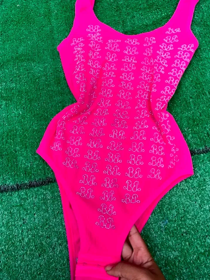 Maillot de bain une pièce rose fluo motifs 2