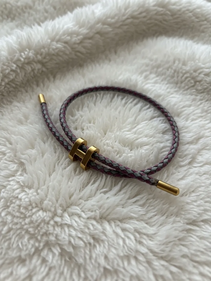 Bracelet Hermes tressé cuir violet dorure