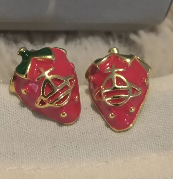 Boucles d'oreilles Vivienne Westwood rose et or