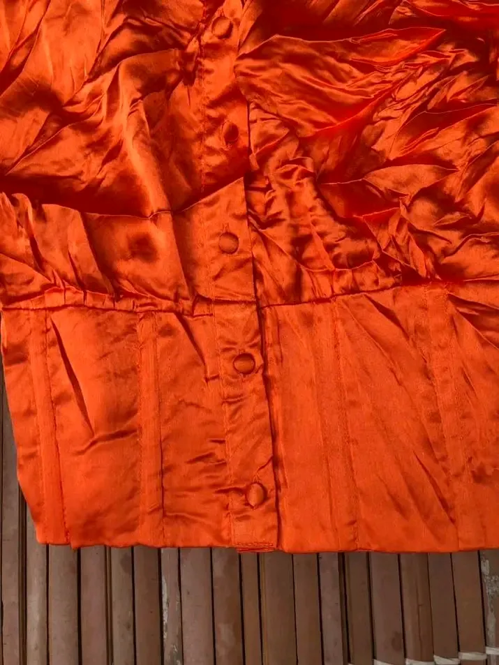 Veste orange brillante taille M