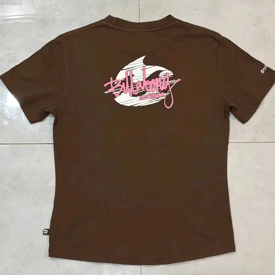 Brown graphic t-shirt with pink logo