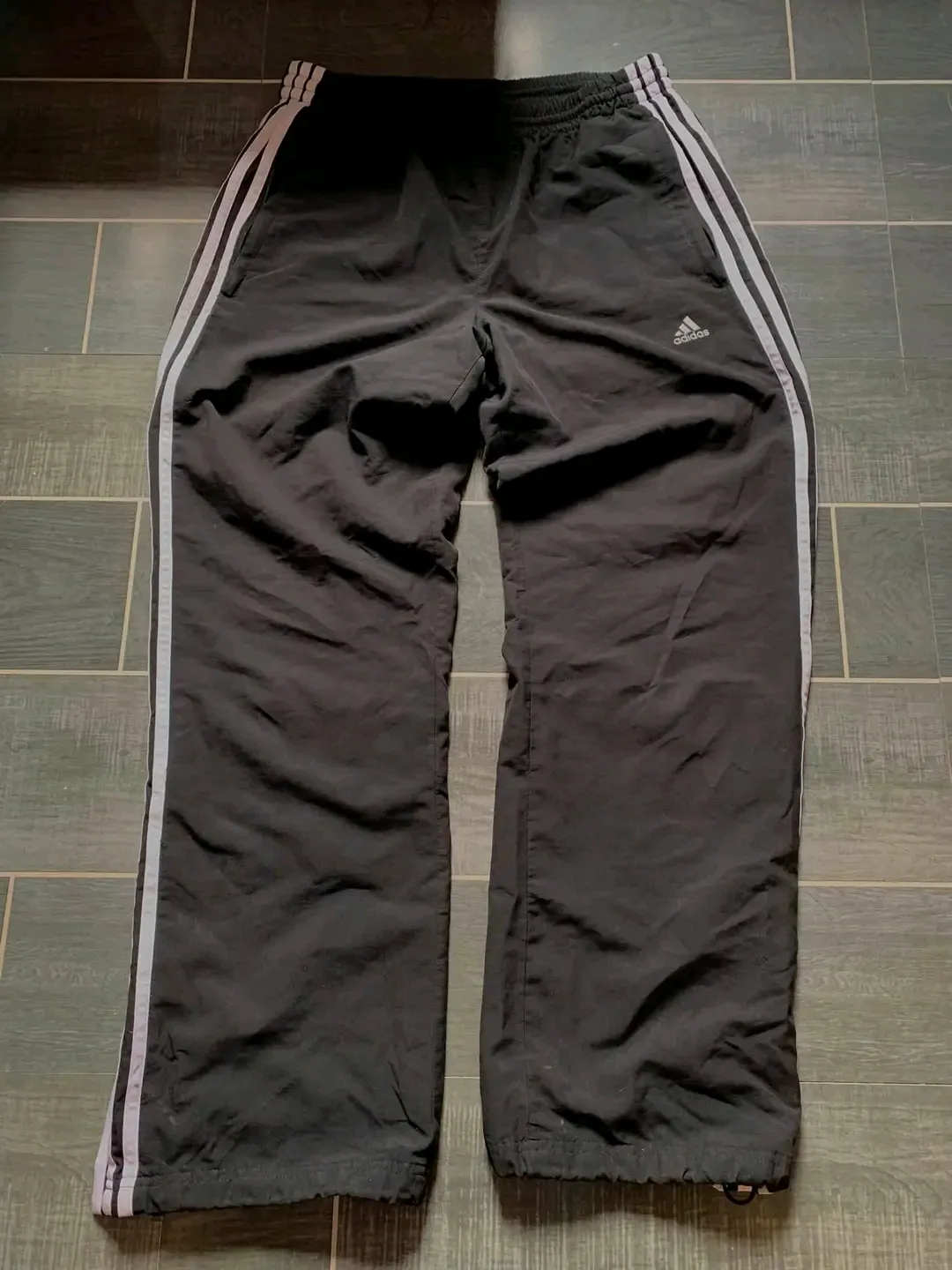 Black track pants with white stripes 3