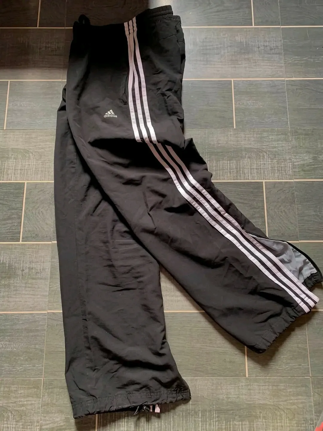 Black track pants with white stripes 2