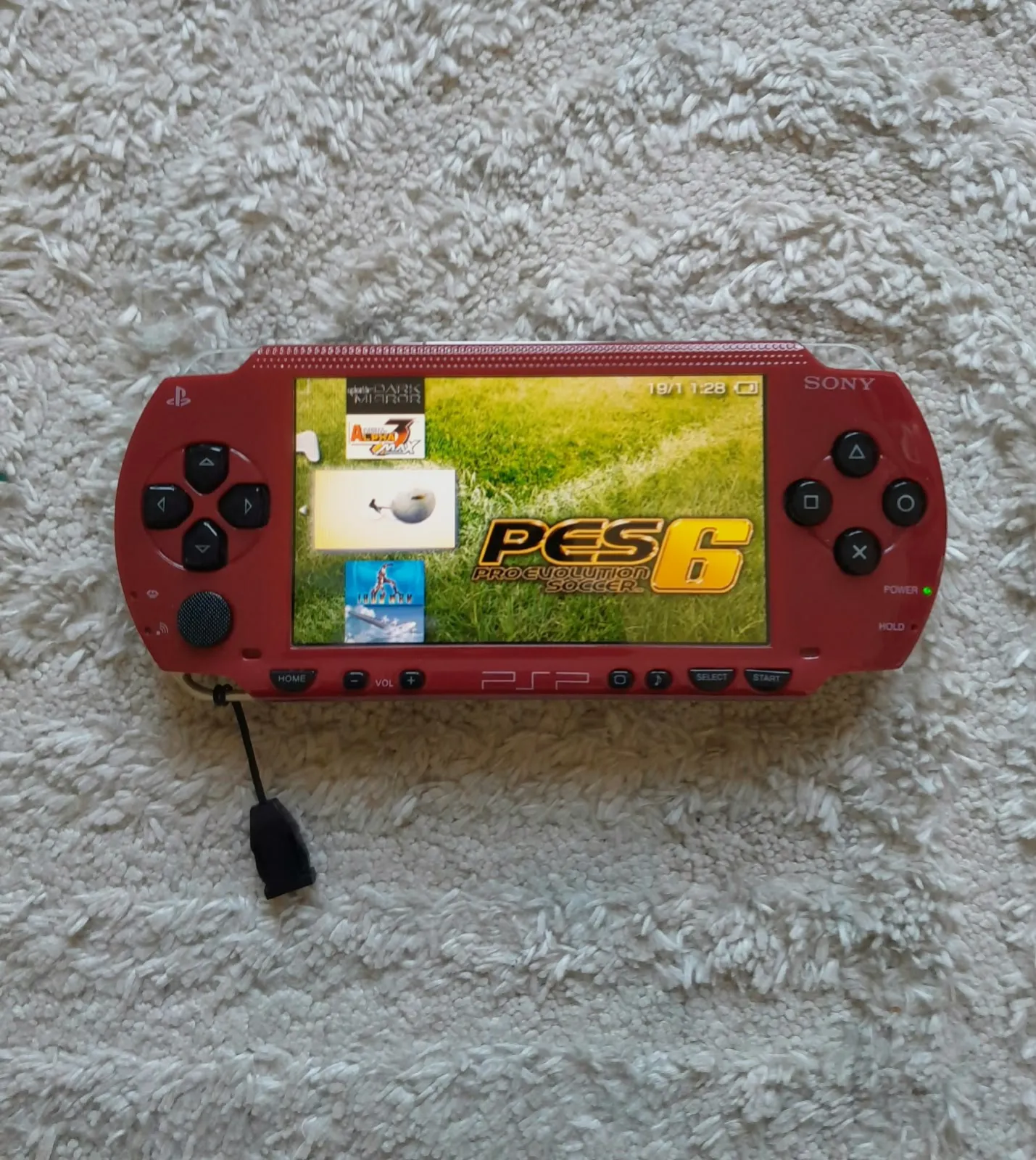 Console portable Sony PSP rouge / 32go / 500 jeux – Sony 4