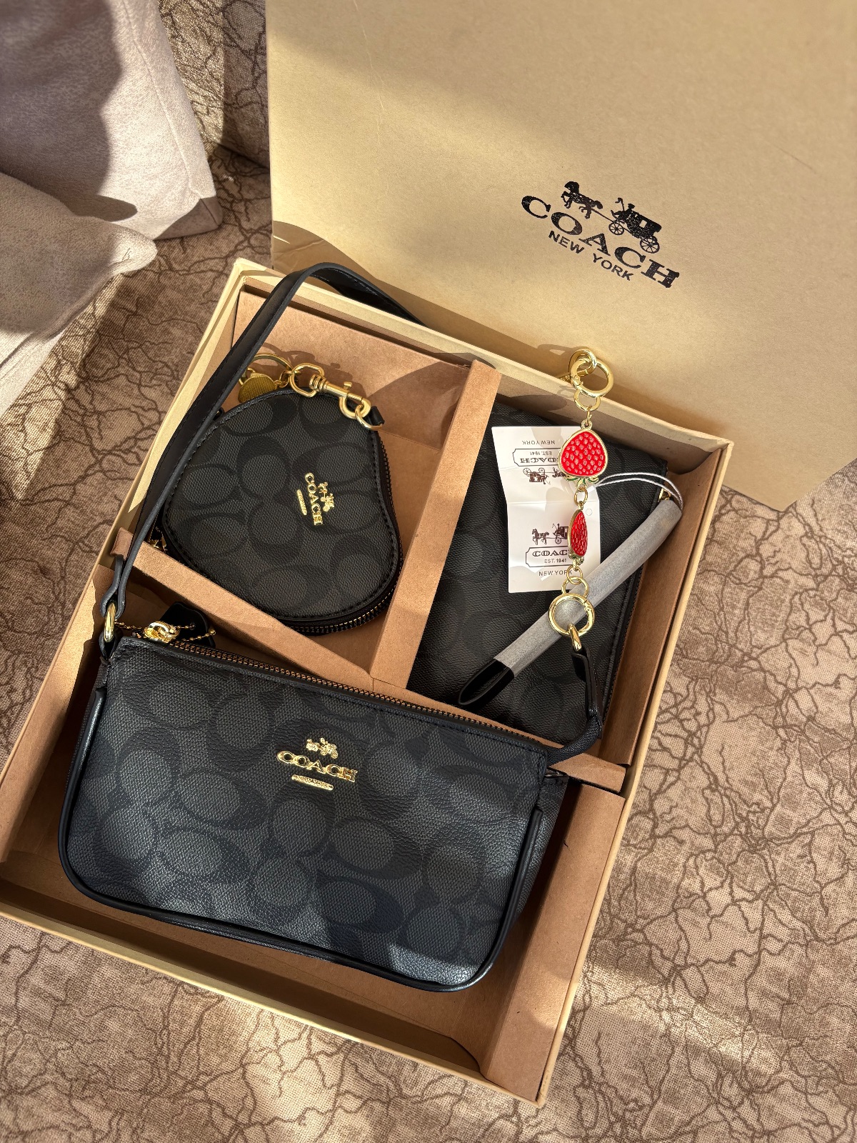 Coach ensemble porte-monnaie et pochette noirs
