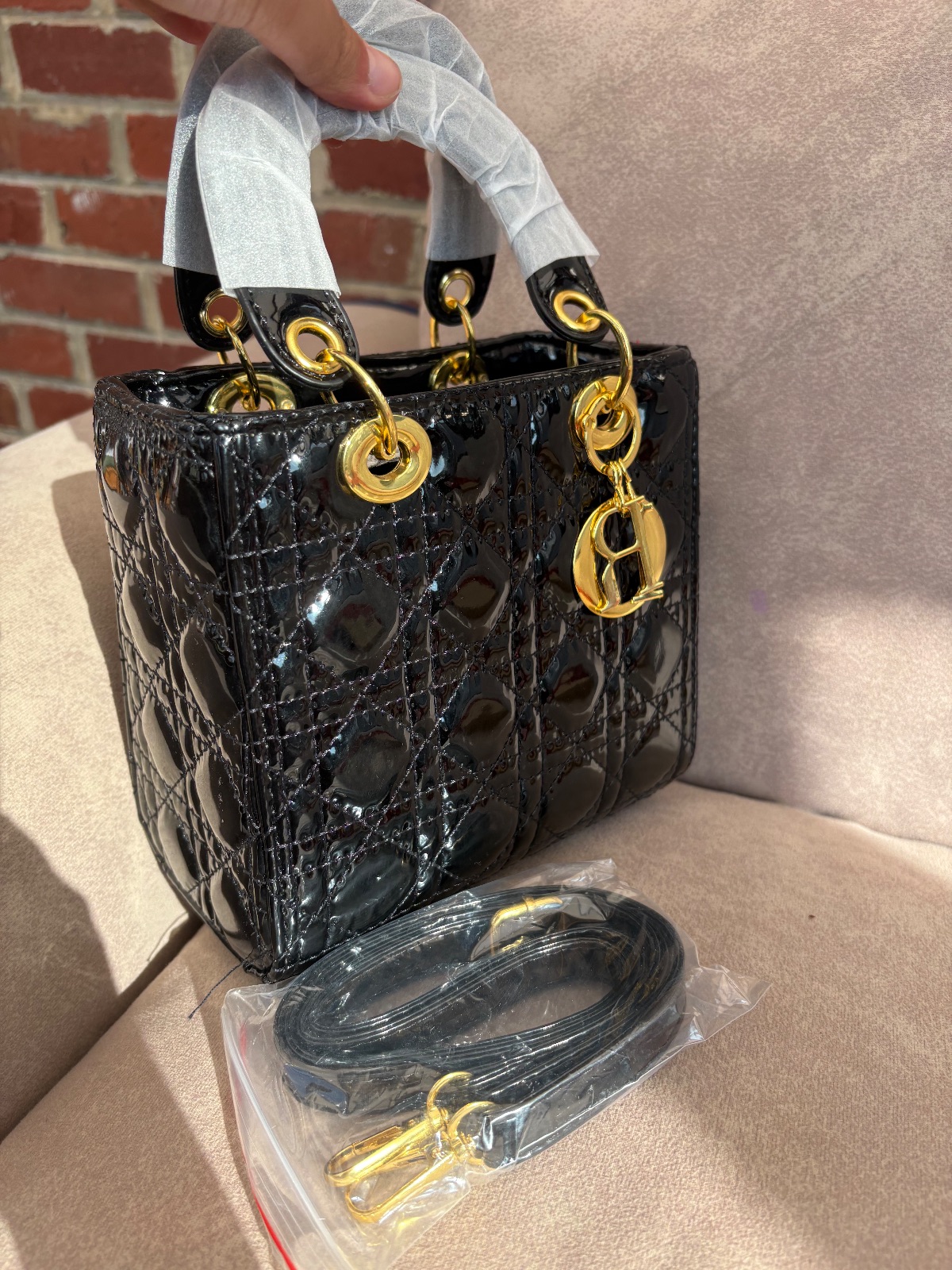 Sac Lady Dior noir vernis chaînes dorées