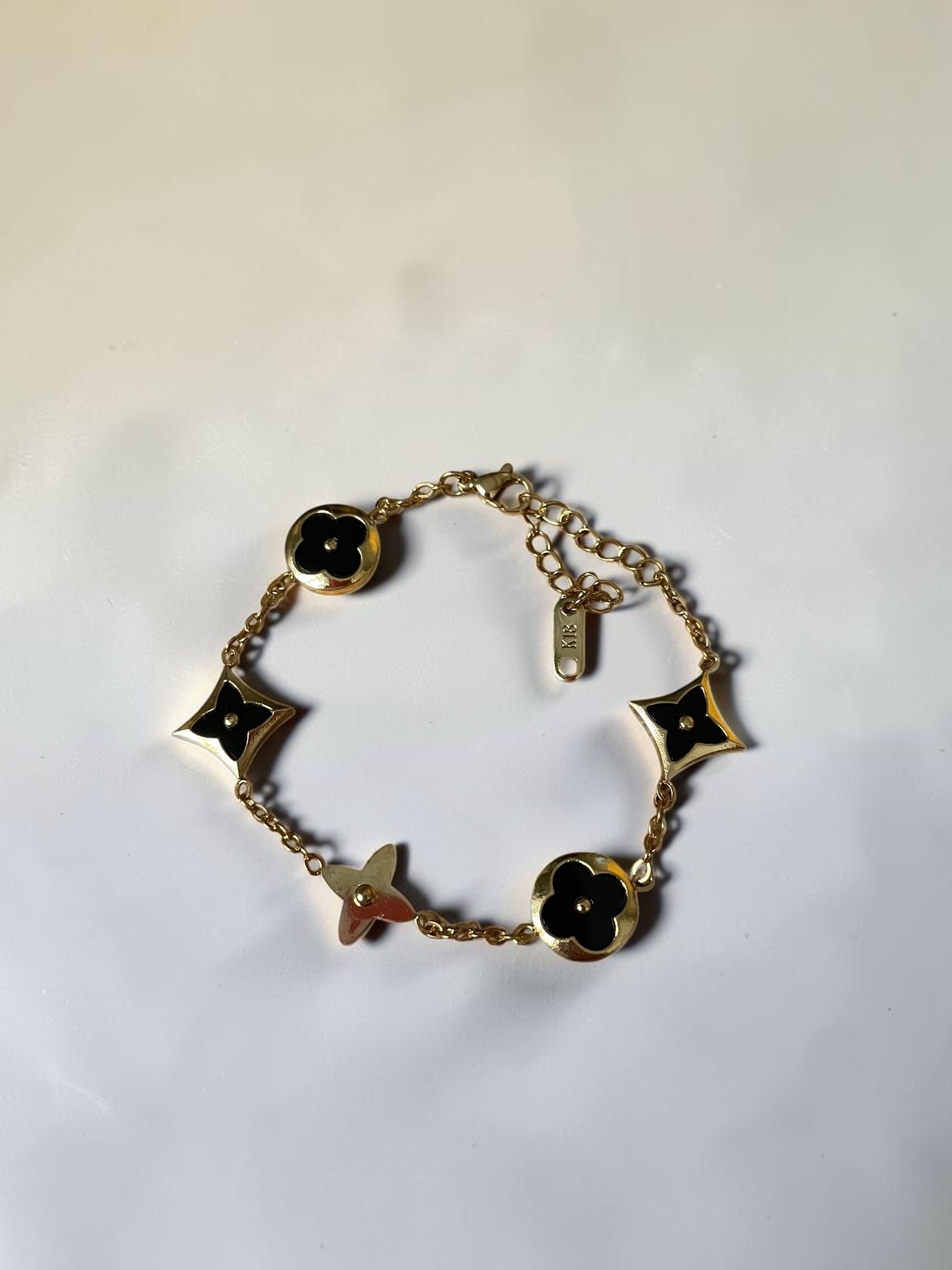 Bracelet chaîne or noir fleurs 2