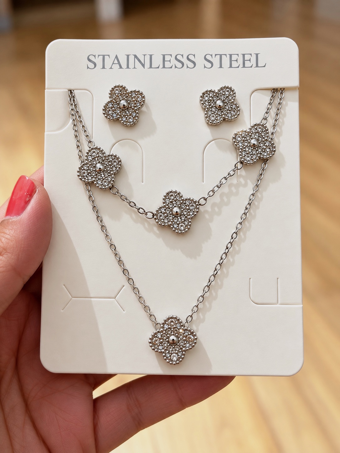 Parure collier et boucles d'oreilles trèfles strass