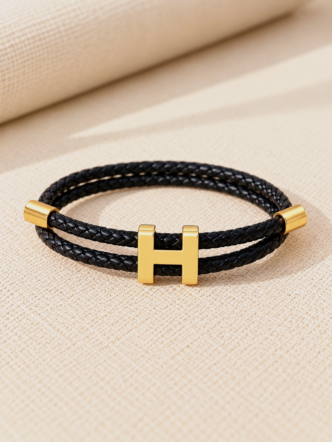 Bracelet double rang tressé noir et métal doré – sans marque – taille Taille unique