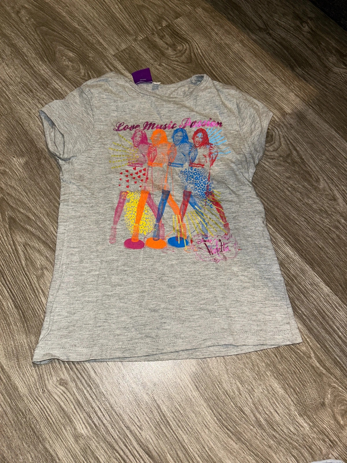 T-shirt violetta 8 ans bon état