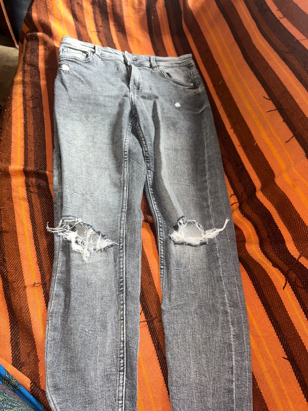 Jean troué taille basse 34