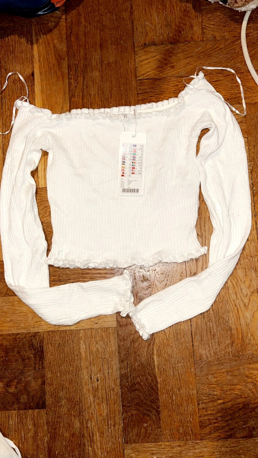 Crop top manche longue épaule dénudé