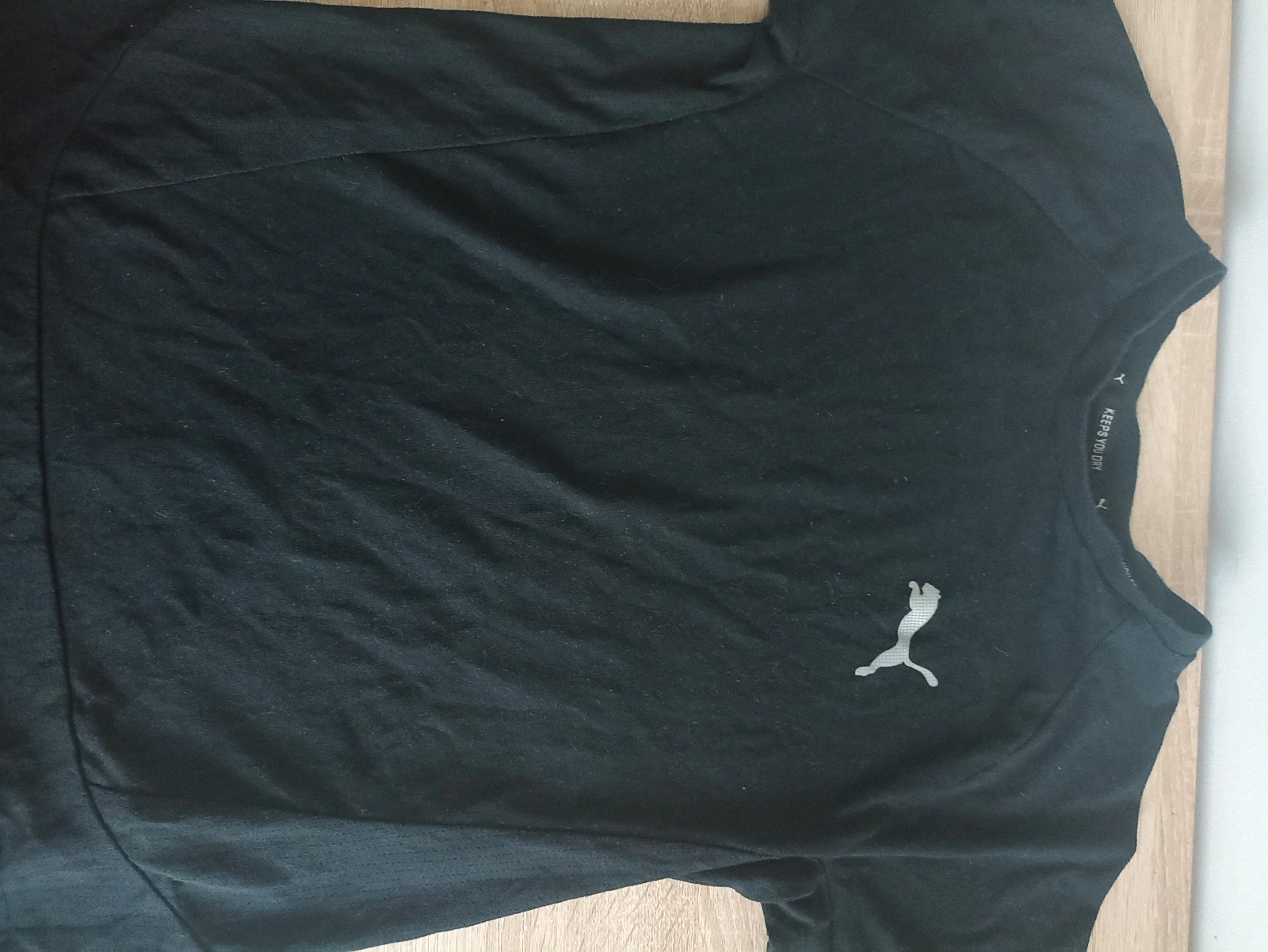 T-shirt sport Puma noir avec logo blanc sur la poitrineT-shirt Puma noir – Taille 12 ans a – Puma – taille 12 ans / 152 cm 3