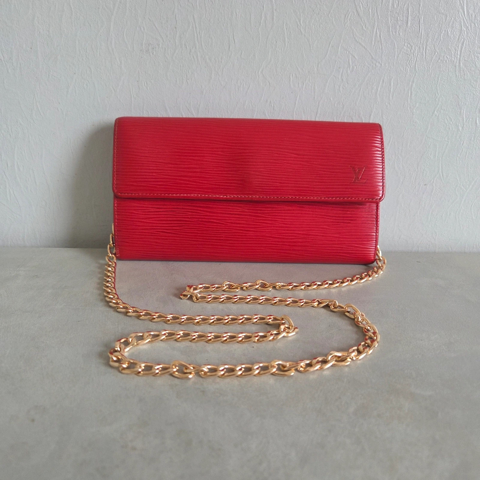 Sac a main pochette Louis vuitton vintage rouge cuir epi wallet sarah