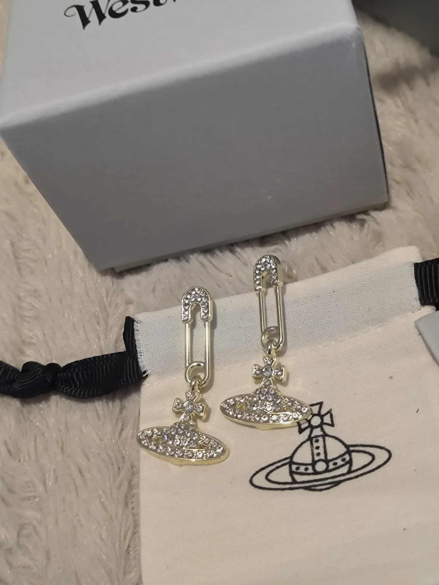Boucles d'oreilles Vivienne Westwood pendentif orbe