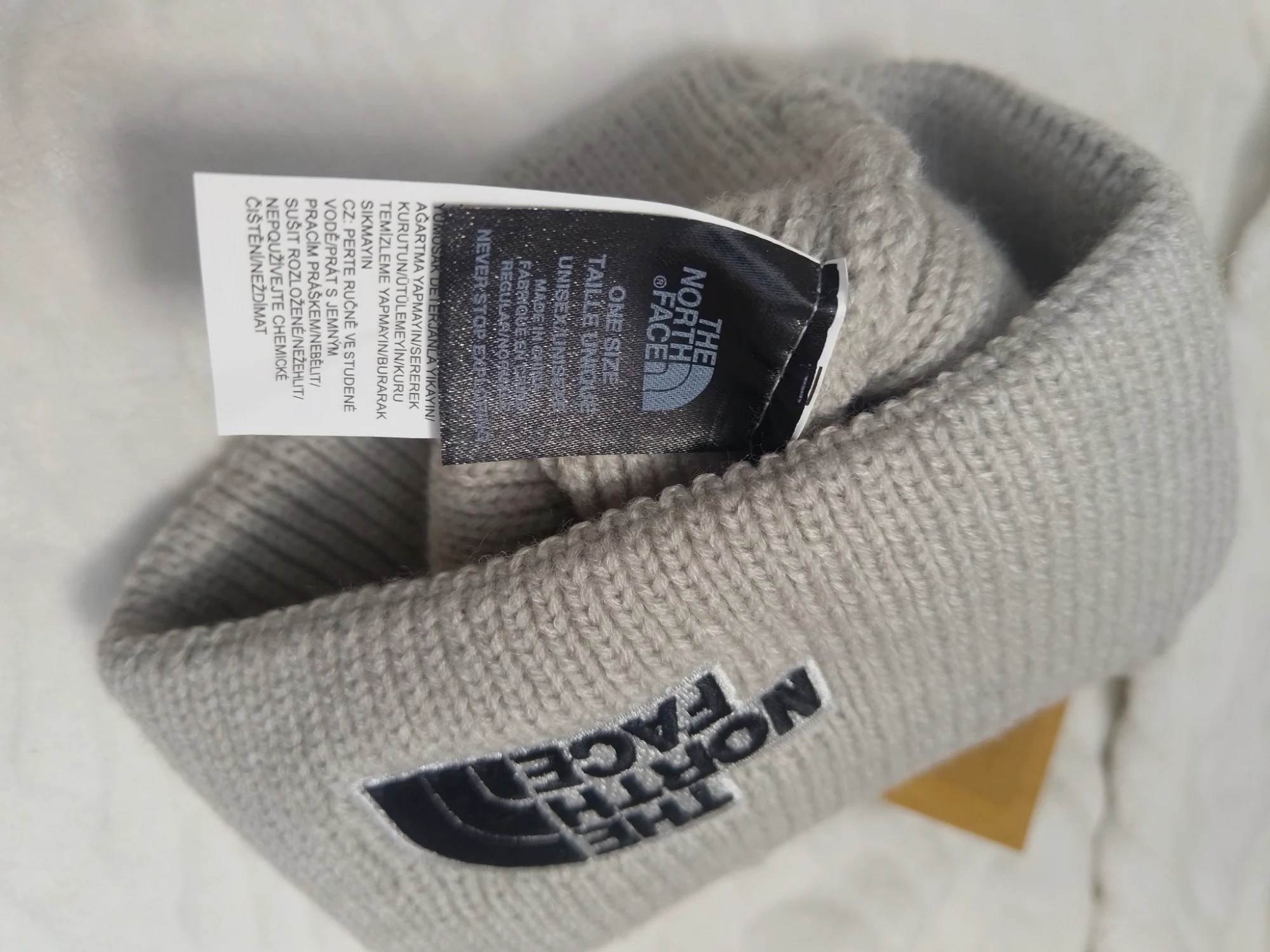 Bonnet en maille gris The North Face
