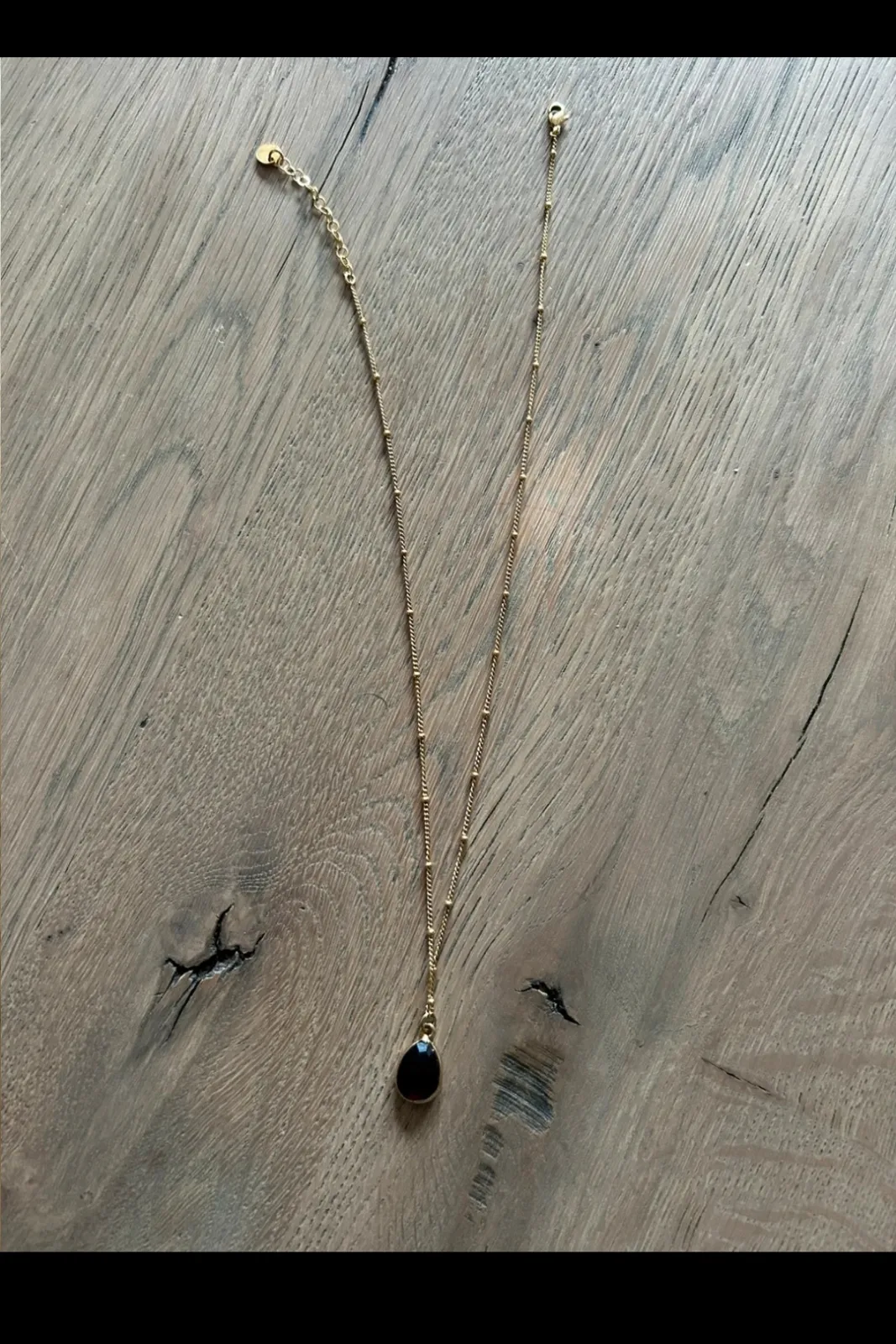 Collier Pépite doré pendentif pierre noire 2