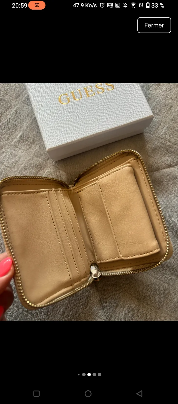 Portefeuille Guess beige motif logo 9