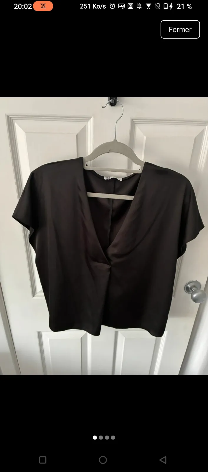 Blouse noire col cache-cœur manches courtes 6