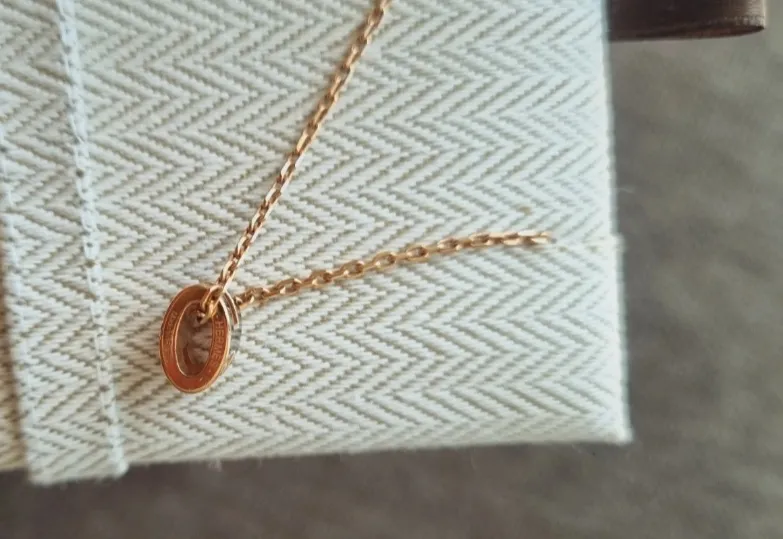 Collier Hermès chaîne fine or rose 6