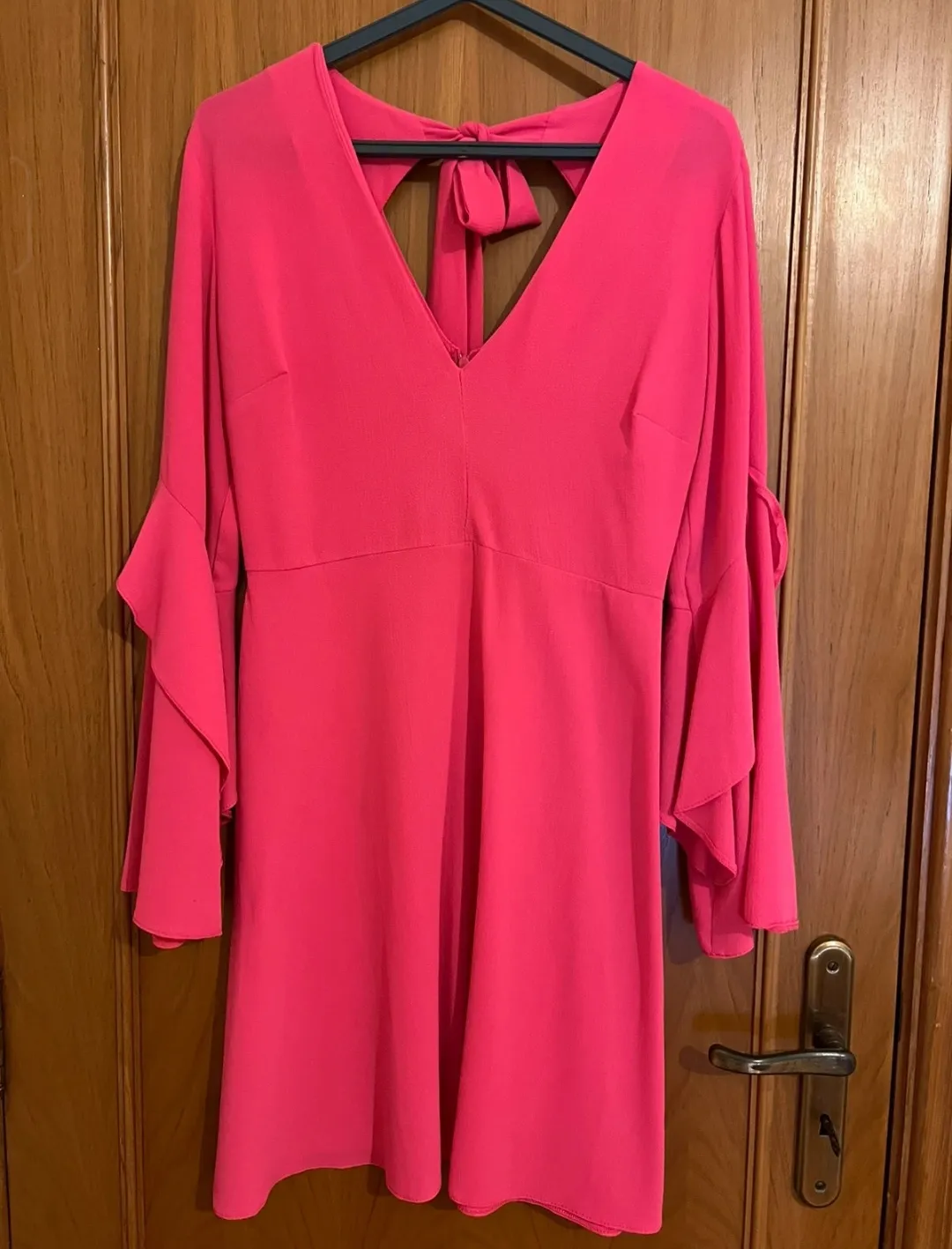 Robe rose fuschia manches volantées