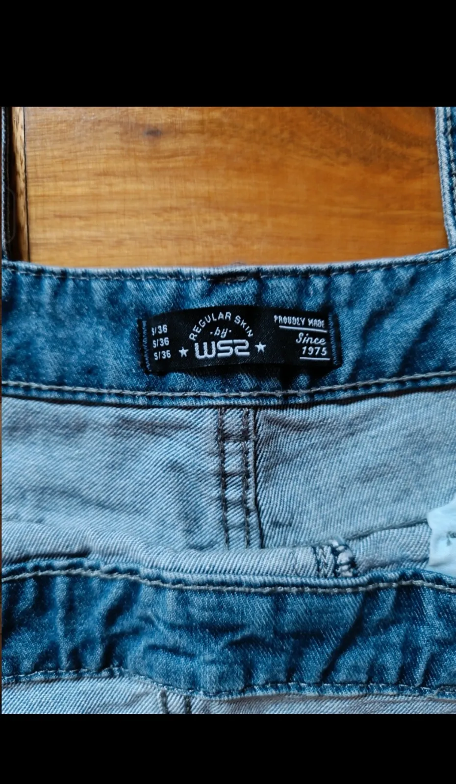 Blue denim dungarees with ripped details 2