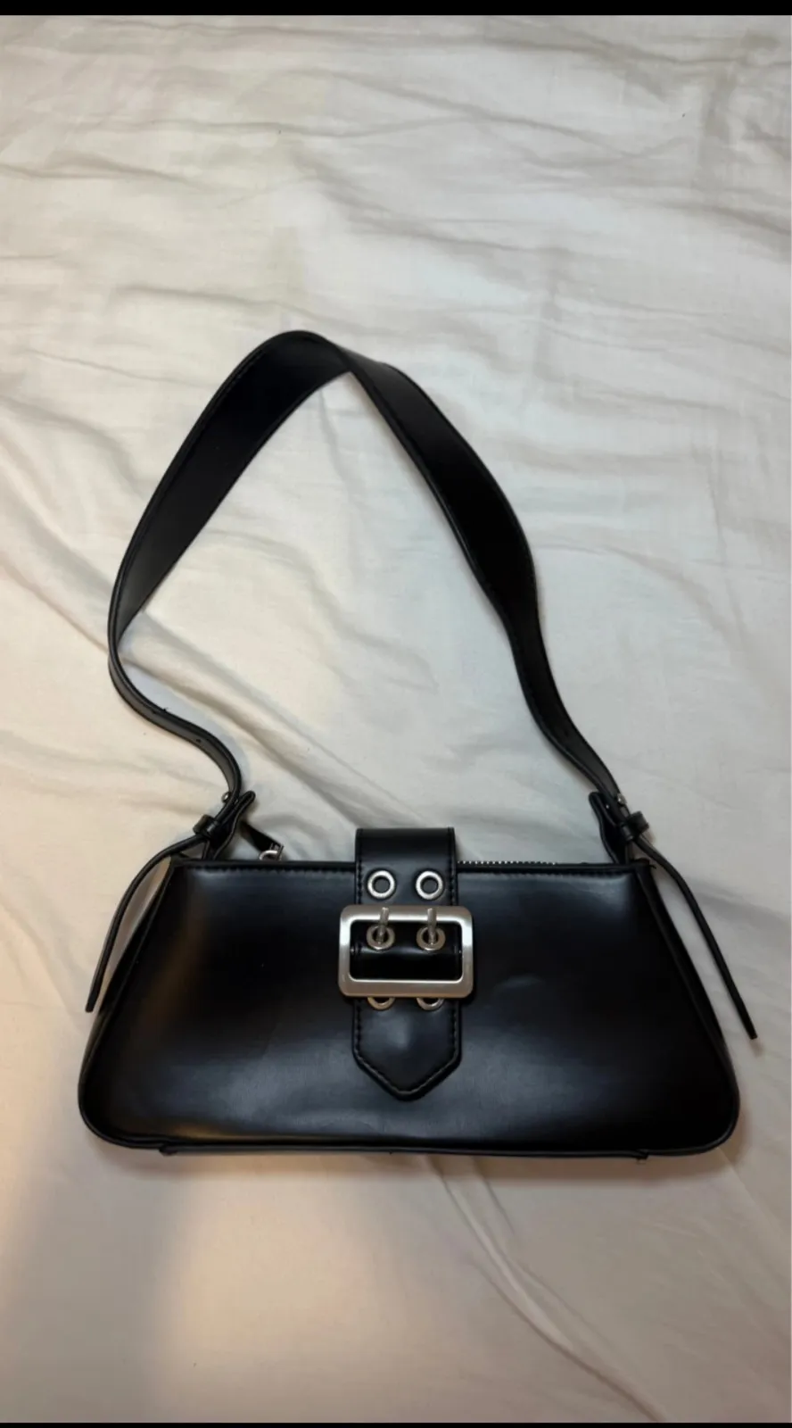 Sac à main noir boucle argentée