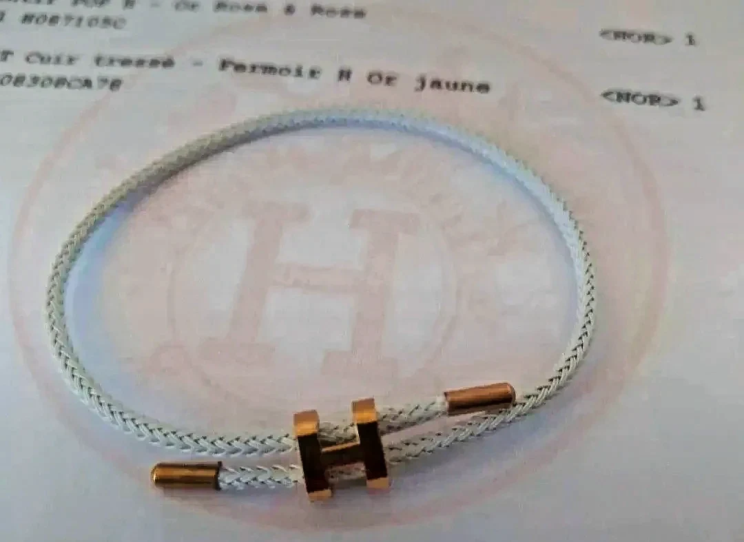 Bracelet corde blanche fermoir H