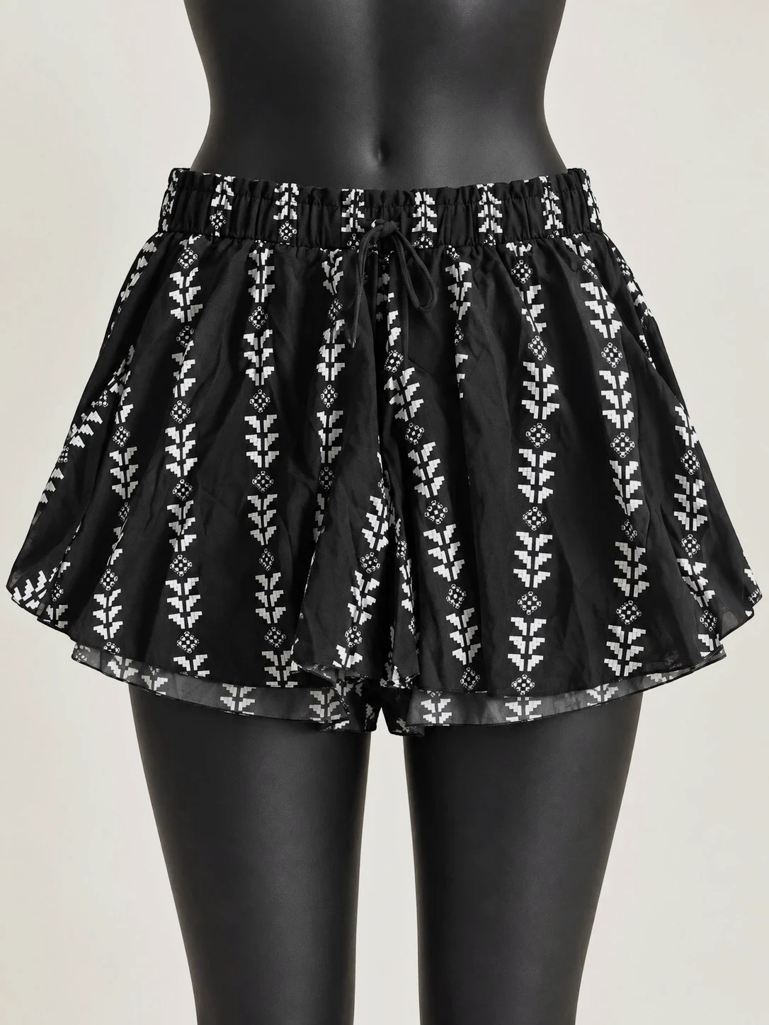 Short ample noir et blanc imprimé géométrique taille élastique